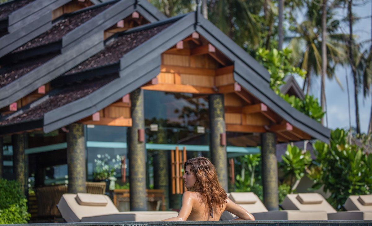 Taking a dip at the pool during sunset