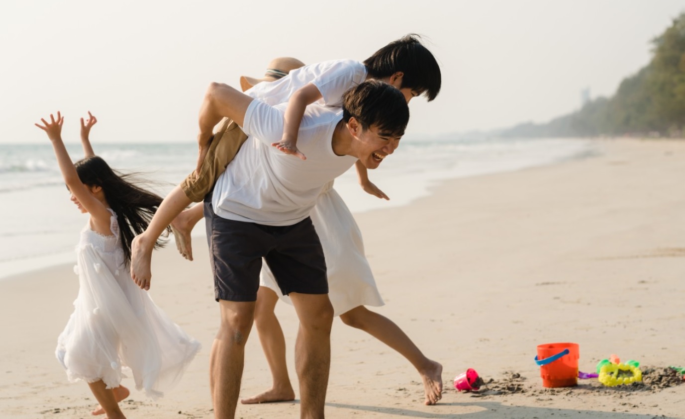 A family creating meaningful and memorable moments at a Koh Samui beach